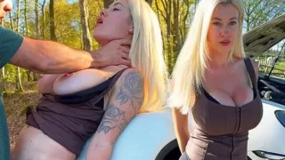 A blonde with big tits in nature near a car exposes her cap for sex